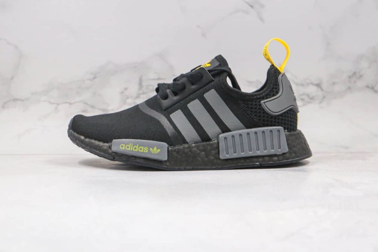 Adidas NMD R1 Black Yellow Tail B8303 | Trendy Sneakers for Fashion-forward Individuals